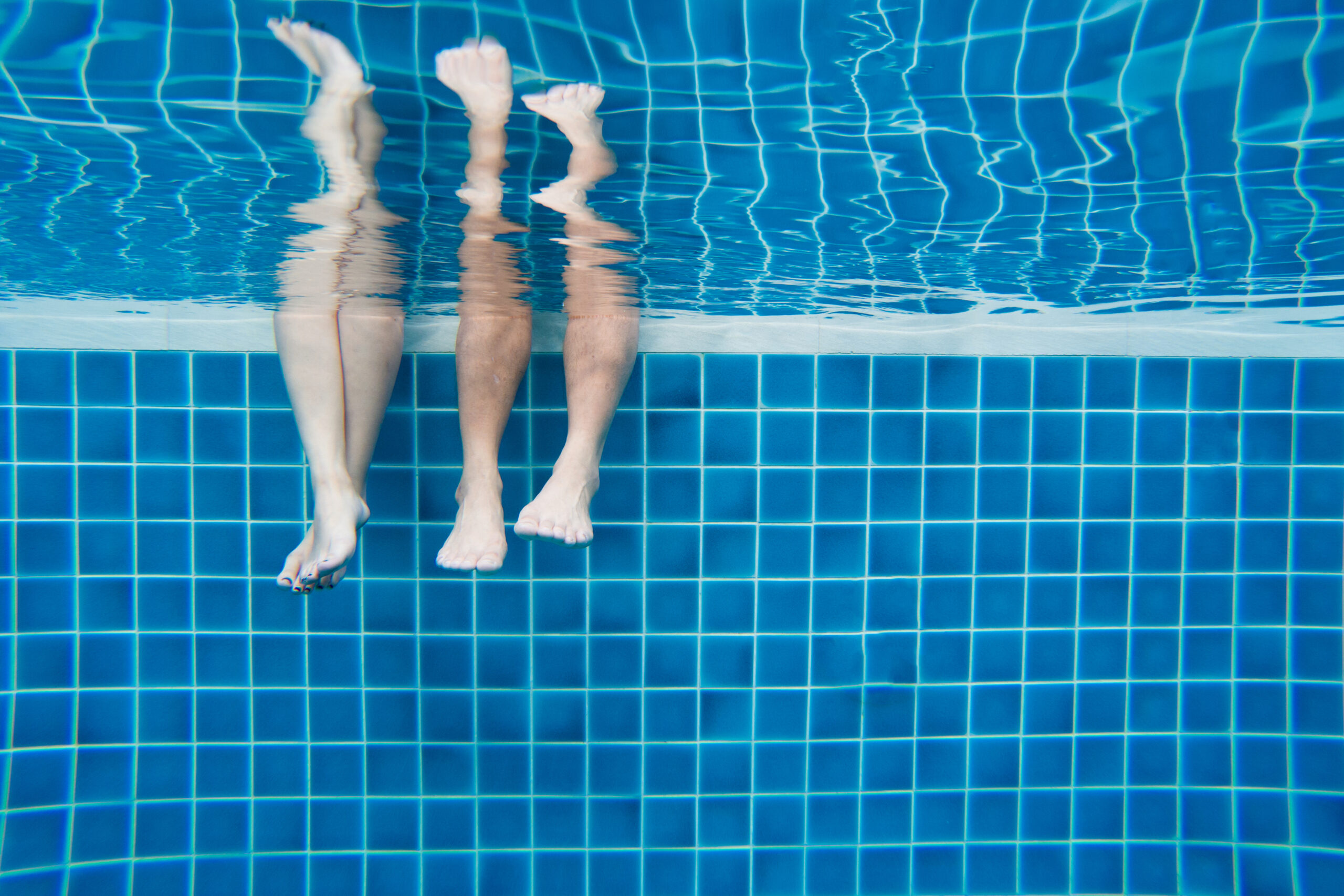 Funny Underwater Family Legs In Swimming Pool, Vacation And Spor